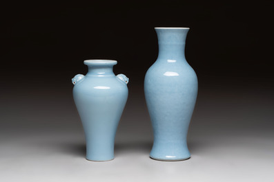 Two Chinese claire-de-lune vases, one with a wooden stand, Kangxi and Yongzheng mark, 19th C.