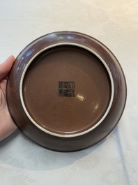 A Chinese aubergine-glazed 'dragon' plate, Jiaqing mark, 19/20th C.
