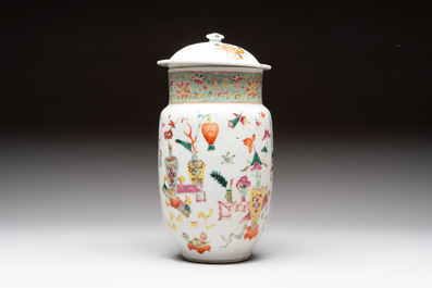 Three Chinese famille rose covered vases, one on a gilt bronze stand, and a covered jar, 19/20th C.