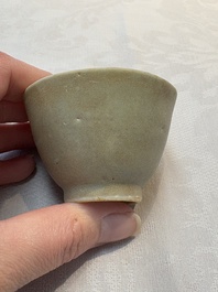 Thirteen Chinese blue and white 'Hatcher Cargo' cups and three celadon-glazed cups, Transitional period