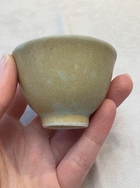 Thirteen Chinese blue and white 'Hatcher Cargo' cups and three celadon-glazed cups, Transitional period