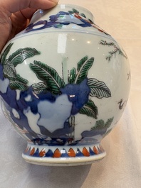 A Chinese wucai vase with narrative design, 19th C.