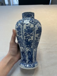A Chinese blue and white octagonal vase and a plate with floral design, Kangxi