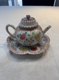 A Chinese famille rose moulded teapot and stand with floral design, Yongzheng/Qianlong