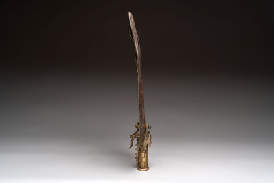 A Chinese brass fan-form temple sign with dragon and phoenix design, Xuantong and Yue Sheng Tang 悅勝堂 mark, dated 1911