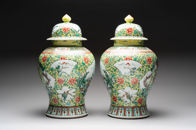 A pair of Chinese famille verte yellow-ground 'Xi Xiang Ji' vases and covers, 19th C.