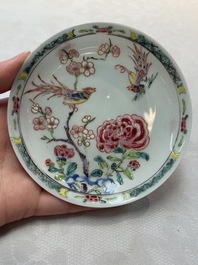 A set of six Chinese famille rose cups and saucers with birds among flowering branches, Yongzheng/Qianlong
