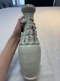 Two Chinese qingbai-glazed urns with applied design, Song