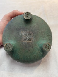 A Chinese bronze tripod censer, Nei Tan Jiao She 内坛郊社 and Qing Qian Gong 清乾宫 mark, 18/19th C.