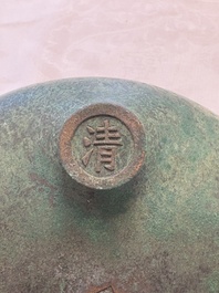 A Chinese bronze tripod censer, Nei Tan Jiao She 内坛郊社 and Qing Qian Gong 清乾宫 mark, 18/19th C.