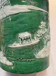 A Chinese verte biscuit 'riverscape' brush pot, artemisia leaf mark, 19th C.