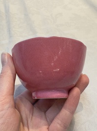 A pair of Chinese ruby-pink-glazed cups with floral anhua design, 18/19th C.