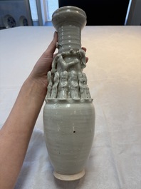 Two Chinese qingbai-glazed urns with applied design, Song