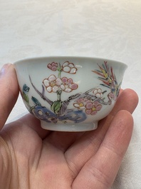 A set of six Chinese famille rose cups and saucers with birds among flowering branches, Yongzheng/Qianlong