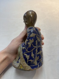 A Chinese champlev&eacute; figure of Luohan, Qianlong mark, 18/19th C.