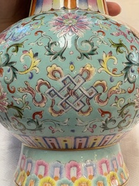 A Chinese famille rose altar vase with 'bajixiang' design, 'benbahu', Qianlong mark, 20th C.
