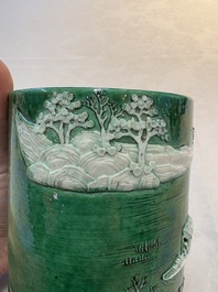 A Chinese verte biscuit 'riverscape' brush pot, artemisia leaf mark, 19th C.