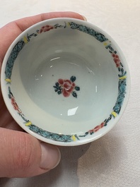 A set of six Chinese famille rose cups and saucers with birds among flowering branches, Yongzheng/Qianlong