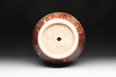 A Chinese peachbloom-glazed vase with dragon-form handles, 18th C.