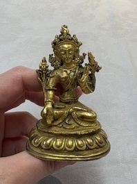 A Tibetan gilt-bronze Tara and a silver Tara, 19/20th C.
