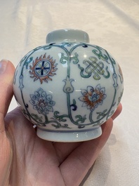 A Chinese doucai 'bajixiang' vase with a reticulated wooden cover, Yongzheng mark, 19/20th C.