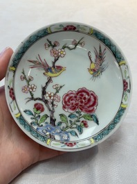 A set of six Chinese famille rose cups and saucers with birds among flowering branches, Yongzheng/Qianlong