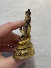 A Tibetan gilt-bronze Tara and a silver Tara, 19/20th C.