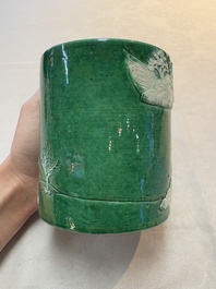 A Chinese verte biscuit 'riverscape' brush pot, artemisia leaf mark, 19th C.
