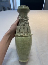 Two Chinese qingbai-glazed urns with applied design, Song