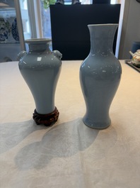 Two Chinese claire-de-lune vases, one with a wooden stand, Kangxi and Yongzheng mark, 19th C.