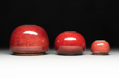 Three Chinese copper-red-glazed water pots, Kangxi mark, 19th C.