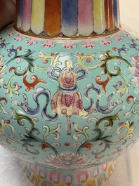 A Chinese famille rose altar vase with 'bajixiang' design, 'benbahu', Qianlong mark, 20th C.