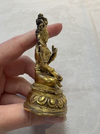 A Tibetan gilt-bronze Tara and a silver Tara, 19/20th C.