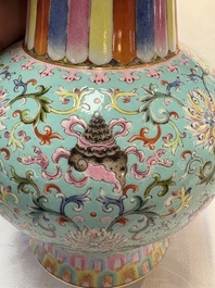 A Chinese famille rose altar vase with 'bajixiang' design, 'benbahu', Qianlong mark, 20th C.