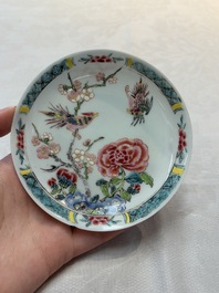 A set of six Chinese famille rose cups and saucers with birds among flowering branches, Yongzheng/Qianlong