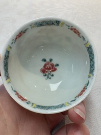 A set of six Chinese famille rose cups and saucers with birds among flowering branches, Yongzheng/Qianlong