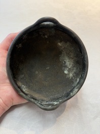A Chinese bronze tripod censer, Xuande mark, 17/18th C.