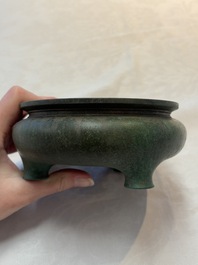 A Chinese bronze tripod censer, Nei Tan Jiao She 内坛郊社 and Qing Qian Gong 清乾宫 mark, 18/19th C.