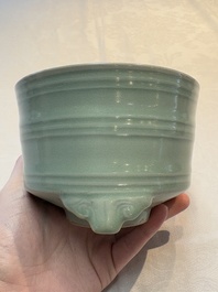 A Chinese Longquan celadon cylindrical tripod censer with &lsquo;trigrams&rsquo; design, Yuan/Ming