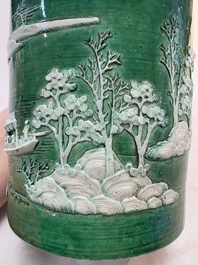 A Chinese verte biscuit 'riverscape' brush pot, artemisia leaf mark, 19th C.