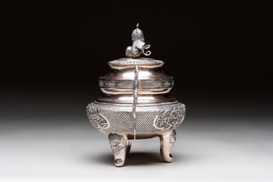 A Vietnamese or Chinese silver tripod censer and cover, 19/20th C.