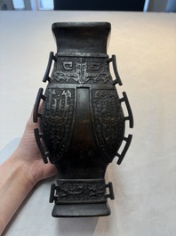 A Chinese bronze vase and ewer, and a Japanese vase, 18/19th C.