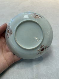 A set of six Chinese famille rose cups and saucers with birds among flowering branches, Yongzheng/Qianlong