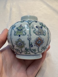 A Chinese doucai 'bajixiang' vase with a reticulated wooden cover, Yongzheng mark, 19/20th C.