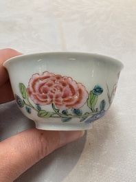 A set of six Chinese famille rose cups and saucers with birds among flowering branches, Yongzheng/Qianlong