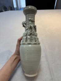 Two Chinese qingbai-glazed urns with applied design, Song
