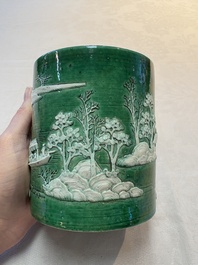 A Chinese verte biscuit 'riverscape' brush pot, artemisia leaf mark, 19th C.
