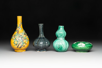 Four Chinese monochrome wares and two wooden stands, 19th C.