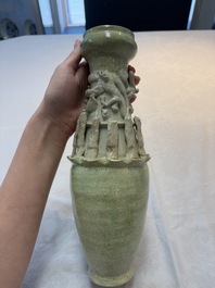 Two Chinese qingbai-glazed urns with applied design, Song