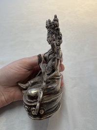 A Tibetan gilt-bronze Tara and a silver Tara, 19/20th C.